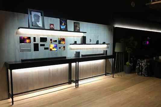 Retail display area over pale finished wood flooring